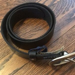 Women’s black belt with decorative buckle holes